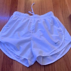 White Nike shorts
